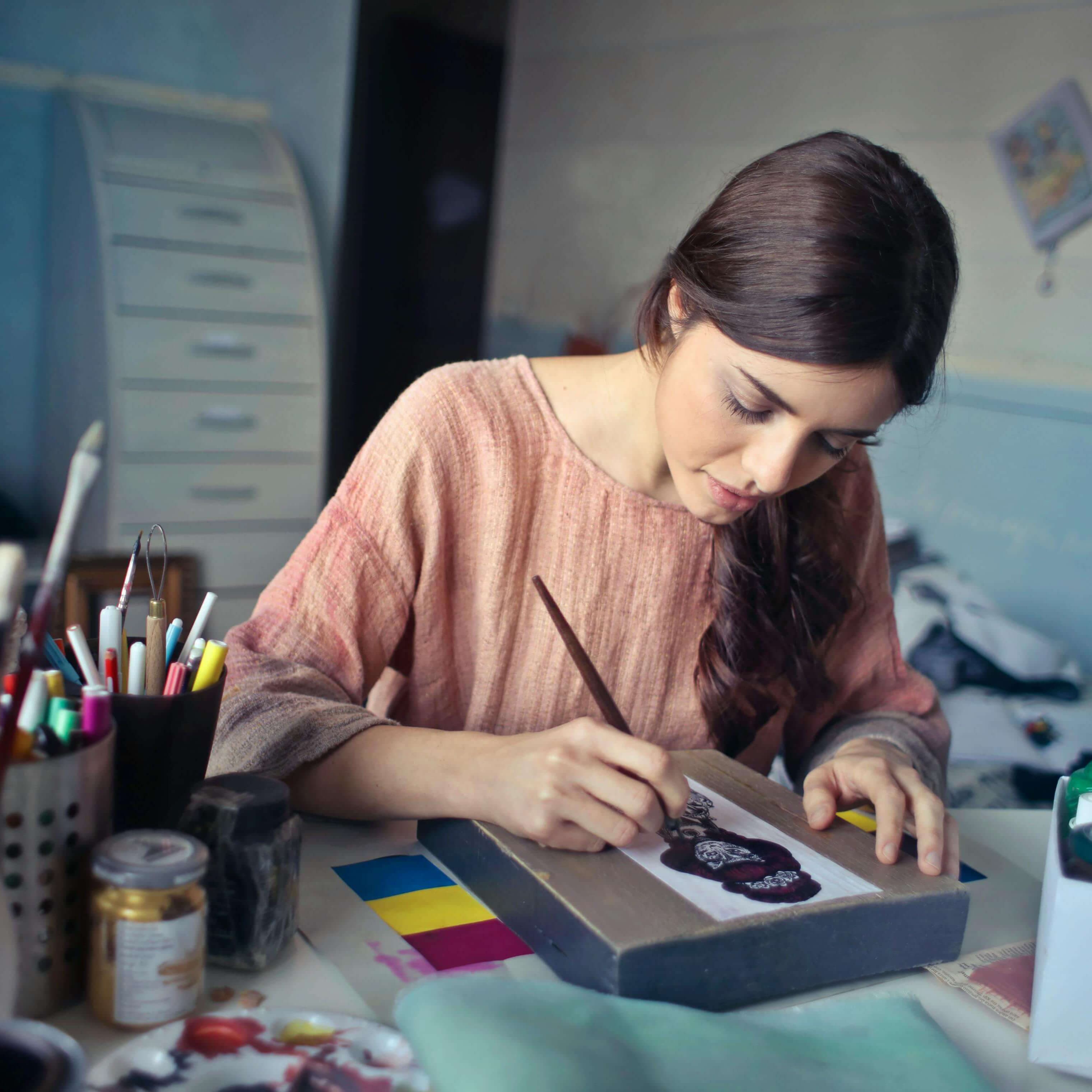 Image of a maker working on a product